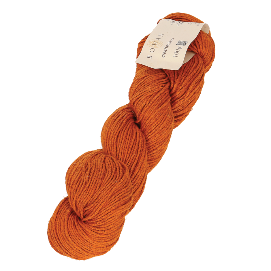 Skein of Rowan Creative Linen yarn in a burnt orange colour called Pumpkin