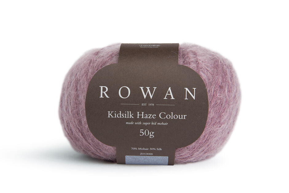 Ball of Rowan Kidsilk Haze Colour in the Wine colourway which is light burgundy.