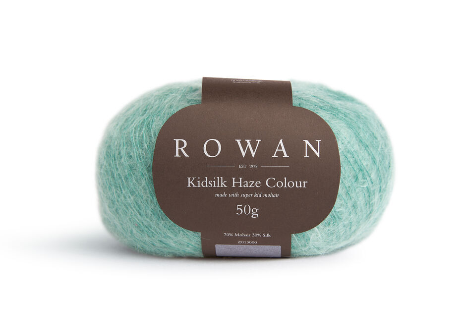 Ball of Rowan Kidsilk Haze Colour in the Bottle colourway which is light green.