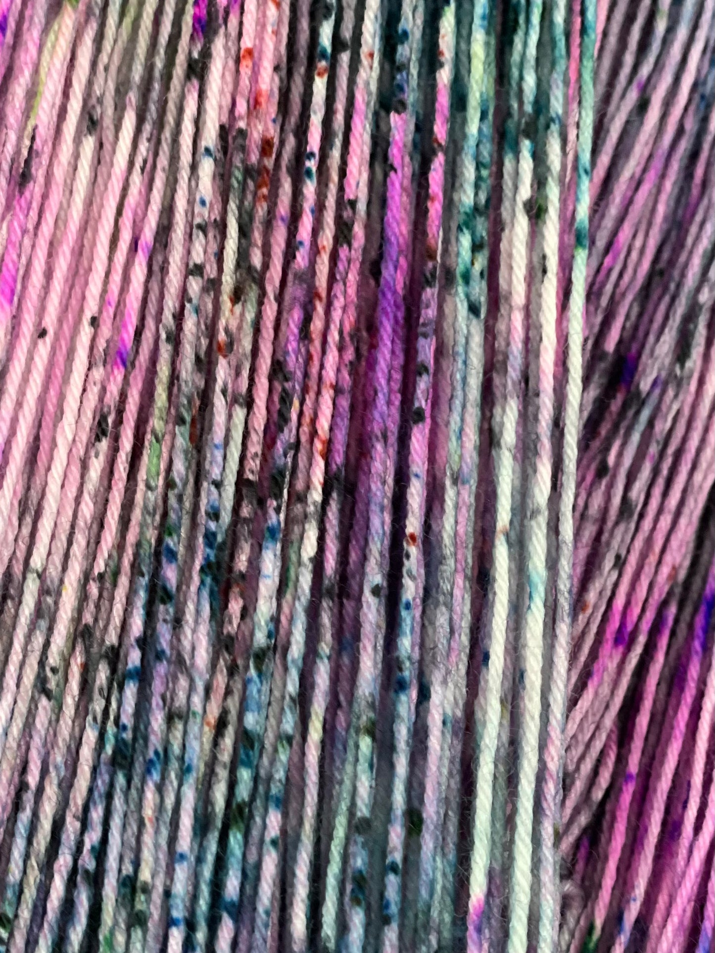 Close up of specked hand dyed yarn.