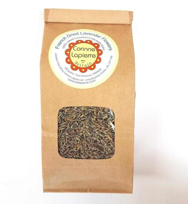 kraft paper packaging with corinne label for dried lavender with clear window showing the lavender buds.