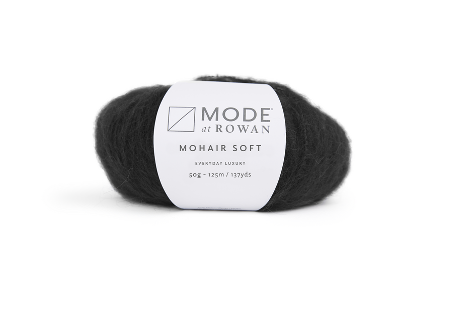 black ball of yarn with mode at rowan label on a plain white background.