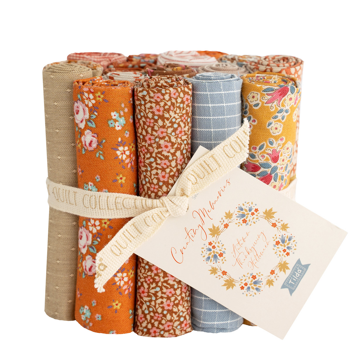 Set of 16 fat eighths by Tilda in autumn colours, photographed on a white background.