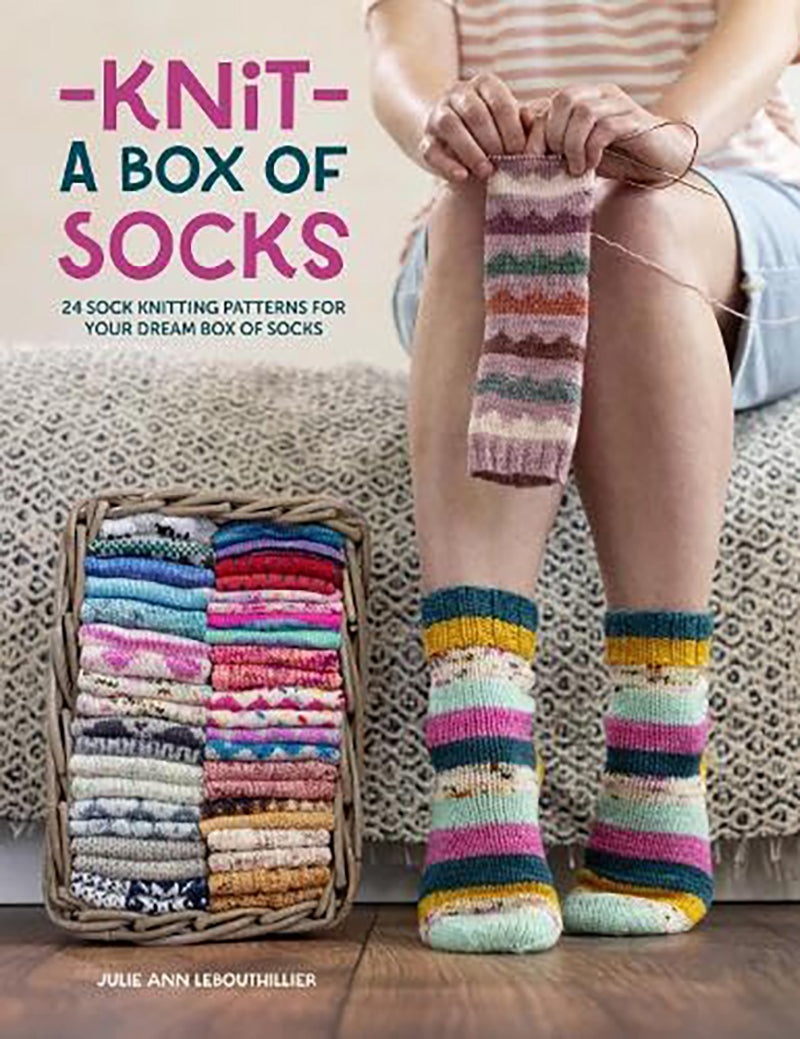 Book cover of 'Knit a Box of Socks' with colorful socks and knitting materials.