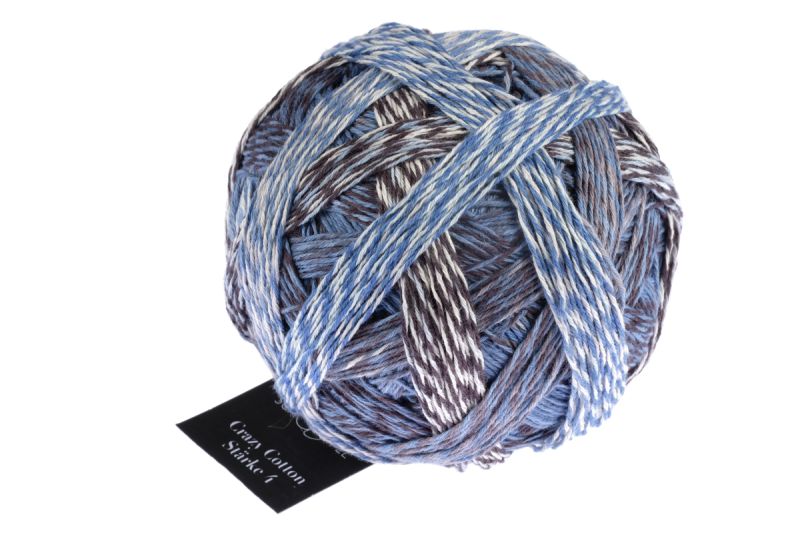 Image shows wound ball of Schoppel Crazy Cotton 4ply/sock. The colour is sea and more with shades of blue, grey and cream.