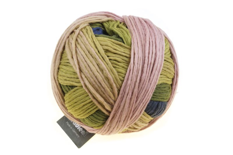 Image shows wound ball of Schoppel Gradient DK yarn. Colourway is 2336 Woman in the Woods/Waldfrau in shades of blue, green and neutral.