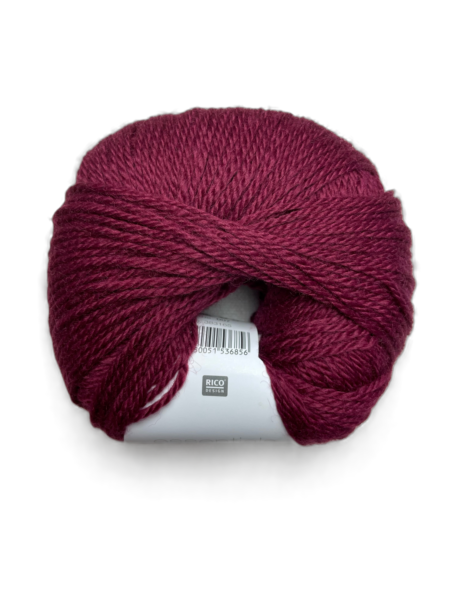 Ball of Rico Design Essentials Merino Plus DK yarn in a burgundy colourway on a white background.