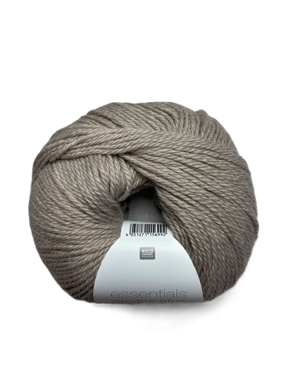 Ball of Rico Design Essentials Merino Plus DK yarn in a stone colourway on a white background.