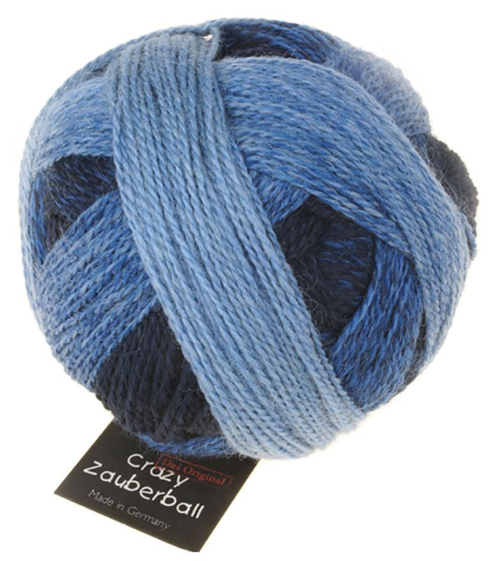 Image shows wound ball of Schoppel Zauberball Crazy 4ply/sock.  The colour is 1535 Stone Washed, with shades of light to dark blue.
