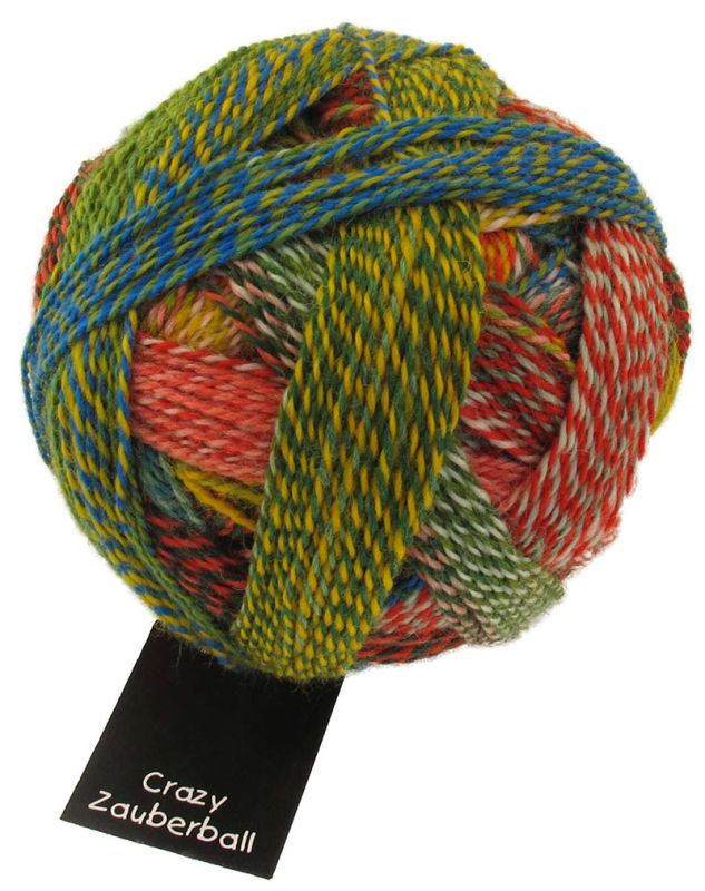 Image shows wound ball of Schoppel Zauberball Crazy 4ply/sock.  The colour is 1701 Parrot/Papagei,  with shades of green, yellow, blue and orange.