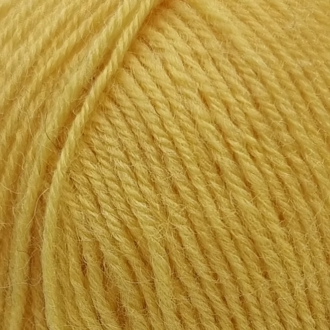 Close-up of a ball of yellow yarn