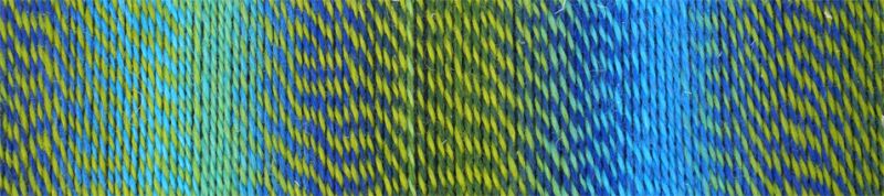Image shows colour palette for  Schoppel Zauberball Crazy 4ply/sock.  The colour is 2100 Domino, with shades of off-white, light ,medium and dark grey.