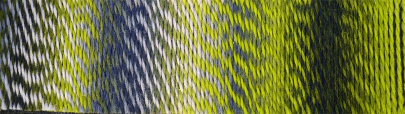 Image shows colour palette for Schoppel Zauberball Crazy 4ply/sock.  The colour is 2204 Green Week/Grune Woche, with shades of green and grey.