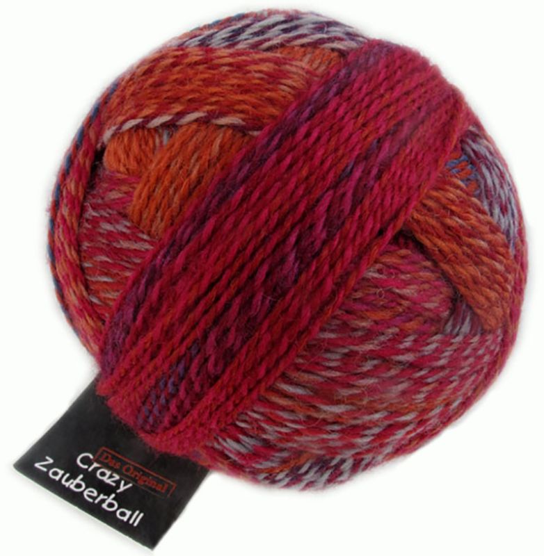 Image shows wound ball of Schoppel Zauberball Crazy 4ply/sock.  The colour is 2231 Nonferrous Metal/Buntmetall,  with shades of rust and grey.