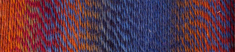 Image shows colour palette for  Schoppel Zauberball Crazy 4ply/sock.  The colour is 2248 Cinnamon Bun/Zimtschnecke,  with shades of orange, rust and slate blue.