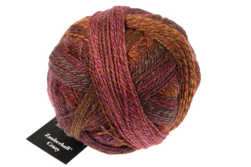 Image shows wound ball of Schoppel Zauberball Crazy 4ply/sock.  The colour is 2312 Piano Bar,  with shades of greens, blues, mauves and yellow.