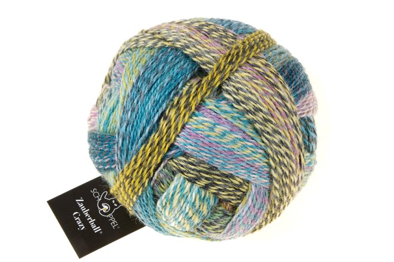 Image shows wound ball of Schoppel Zauberball Crazy 4ply/sock.  The colour is 2355 Garden Party/Gartenparty, with shades of mauve, blue, turquoise and yellow.