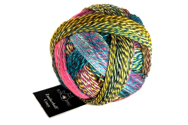 Image shows wound ball of Schoppel Zauberball Crazy 4ply/sock.  The colour is 2389 Anniversary Party/Jubilaumsparty, with shades of yellow, blue, pink and mauve.