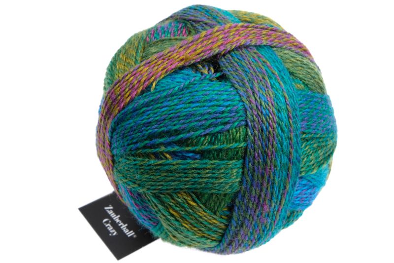 Image shows wound ball of Schoppel Zauberball Crazy 4ply/sock.  The colour is 2404 Deep Water/Tiefe Wasser, with shades of blue, turquoise, green and yellow.