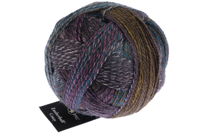 Image shows wound ball of Schoppel Zauberball Crazy 4ply/sock.  The colour is 2475 Background Noise/Hintergudrauschen, with shades of dark blue, olive and purple.