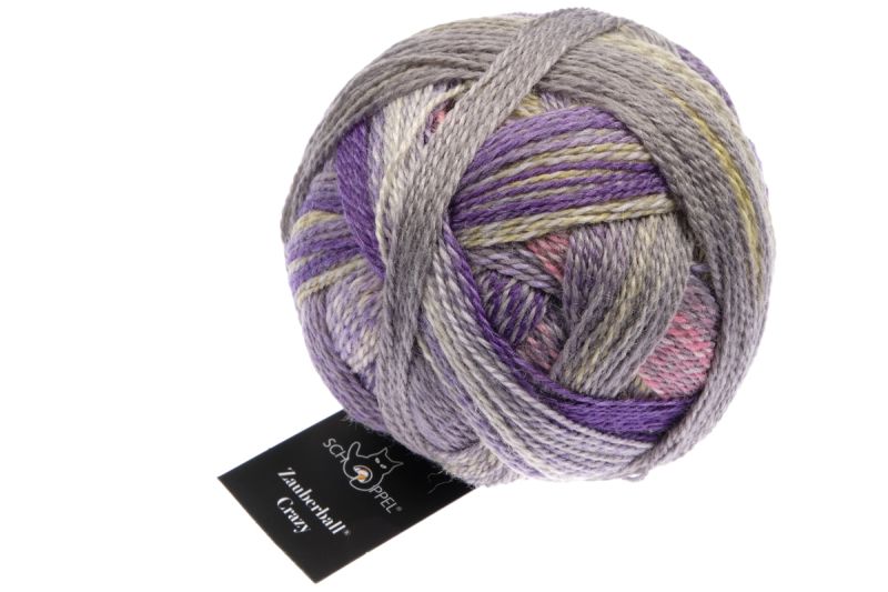 Image shows wound ball of Schoppel Zauberball Crazy 4ply/sock.  The colour is 2514 Privy Council/Geheimrat, with shades of purple, grey and pink.