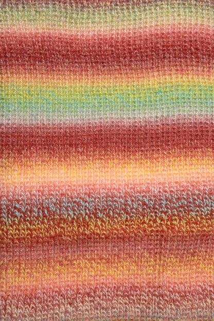 Image shows knitted swatch for Schoppel Zauberball Crazy 4ply/sock.  The colour is 2545 Early Autumn by Kieran Foley, with shades of tan, yellow and light blue.