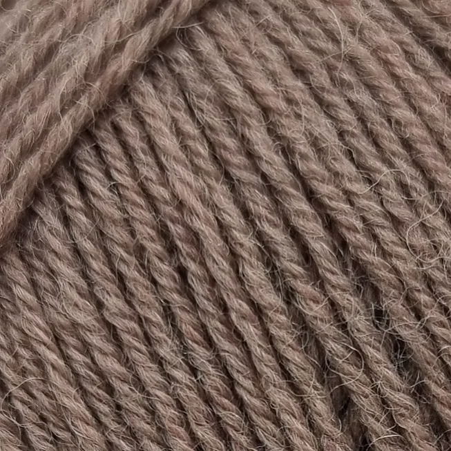 close up of light brown yarn 