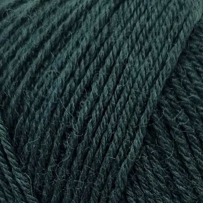 Close-up of dark green yarn with visible texture
