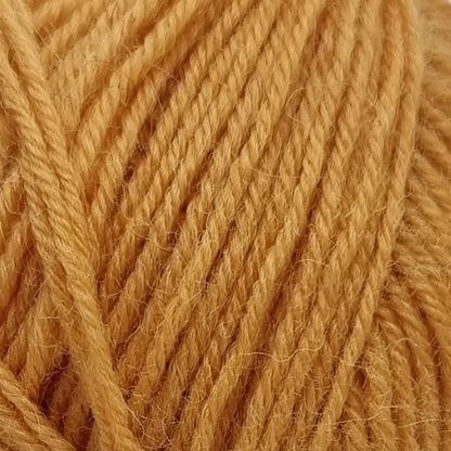 close up of mustard yellow yarn.