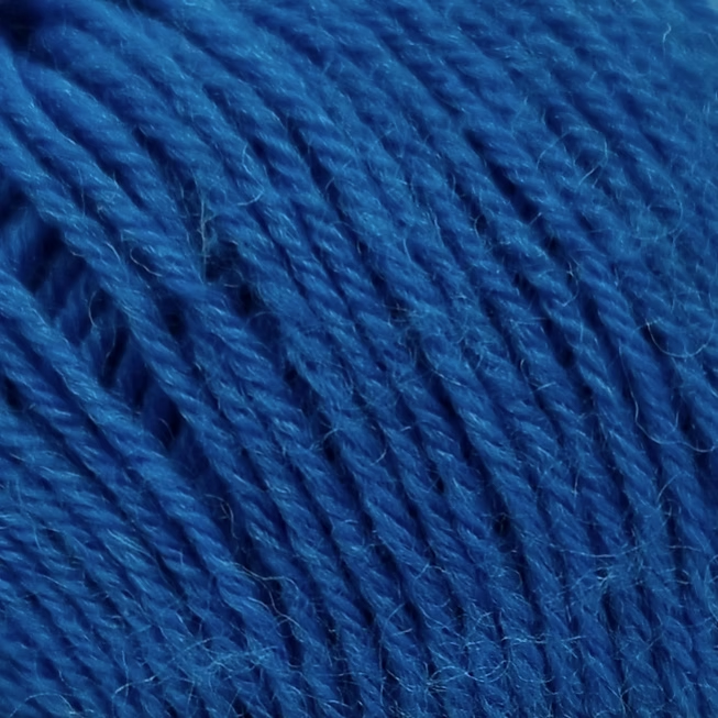 close up of teal yarn with woolen texture.