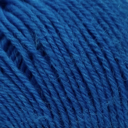 close up of teal yarn with woolen texture.