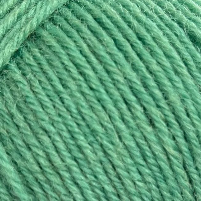 close up of minty green yarn