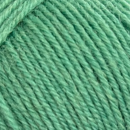 close up of minty green yarn