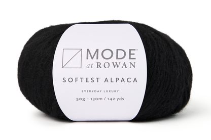 ball of black yarn with a mode at rowan label on a white background.