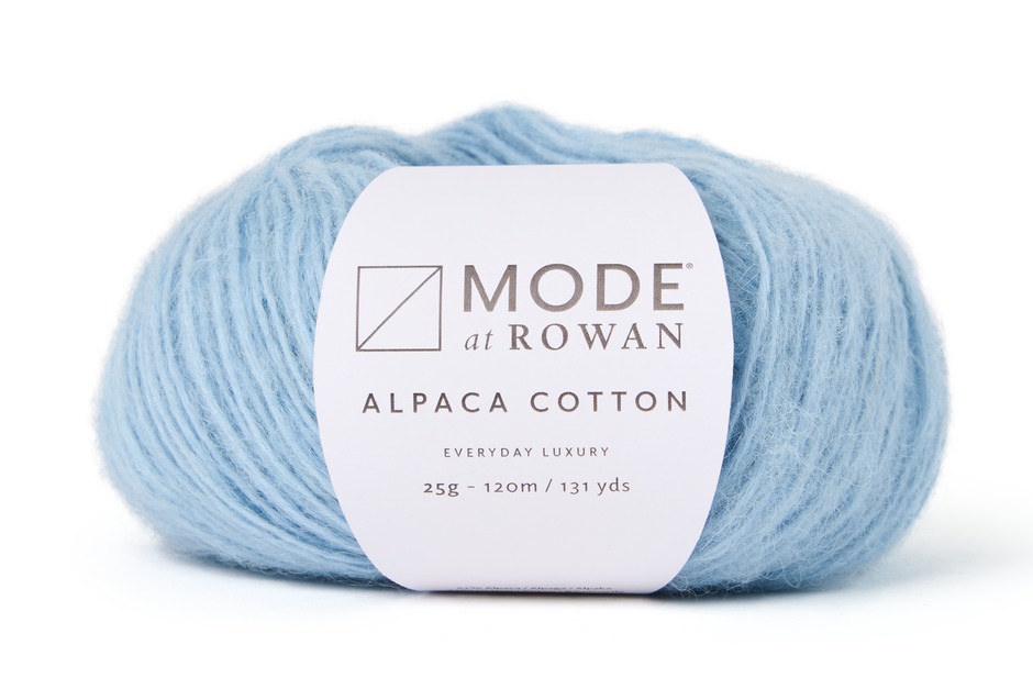 light blue ball of yarn with a mode at rowan label on a plain white background.