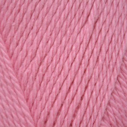 close up of powder pink yarn ball.