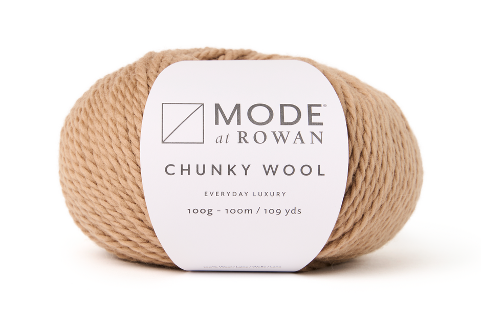 ball of light brown chunky yarn with a mode at rowan label. on a plain white background.