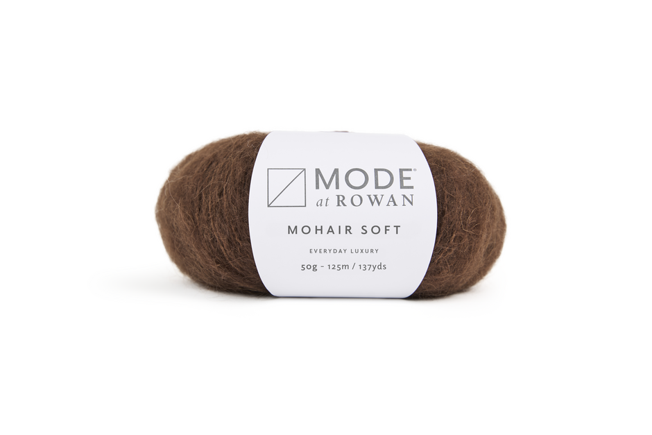 ball of chocolate brown yarn with mode at rowan label with grey writing on a plain white background.