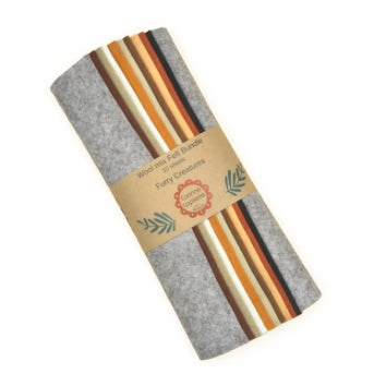 bundle of natural coloured felt with corinne label around them.