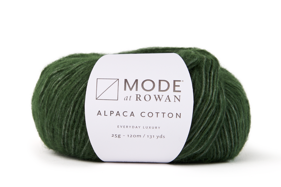 green ball of yarn with mode at rowan label on a plain white background.
