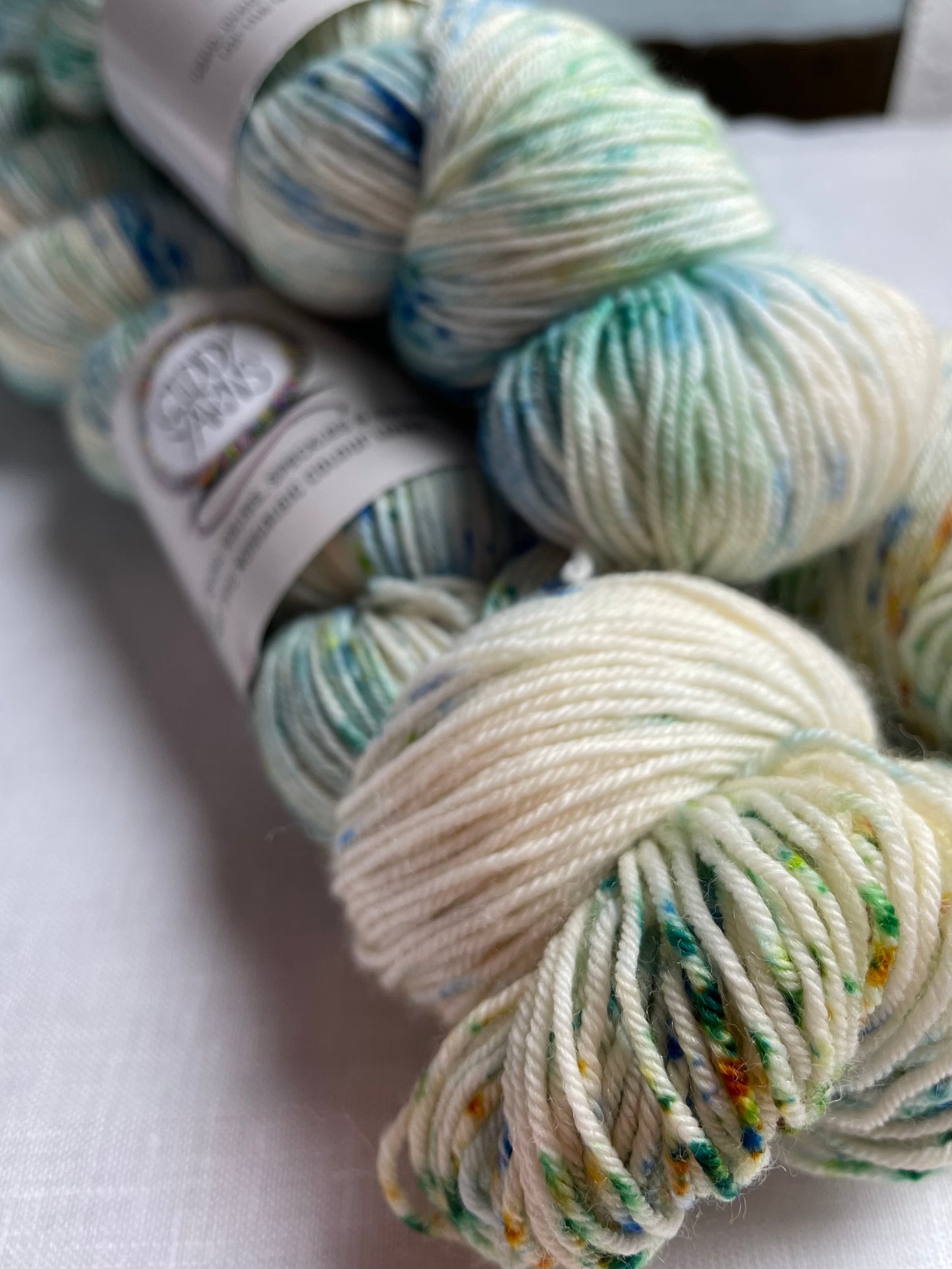 Close up of some multi coloured speckles on hand dyed yarn