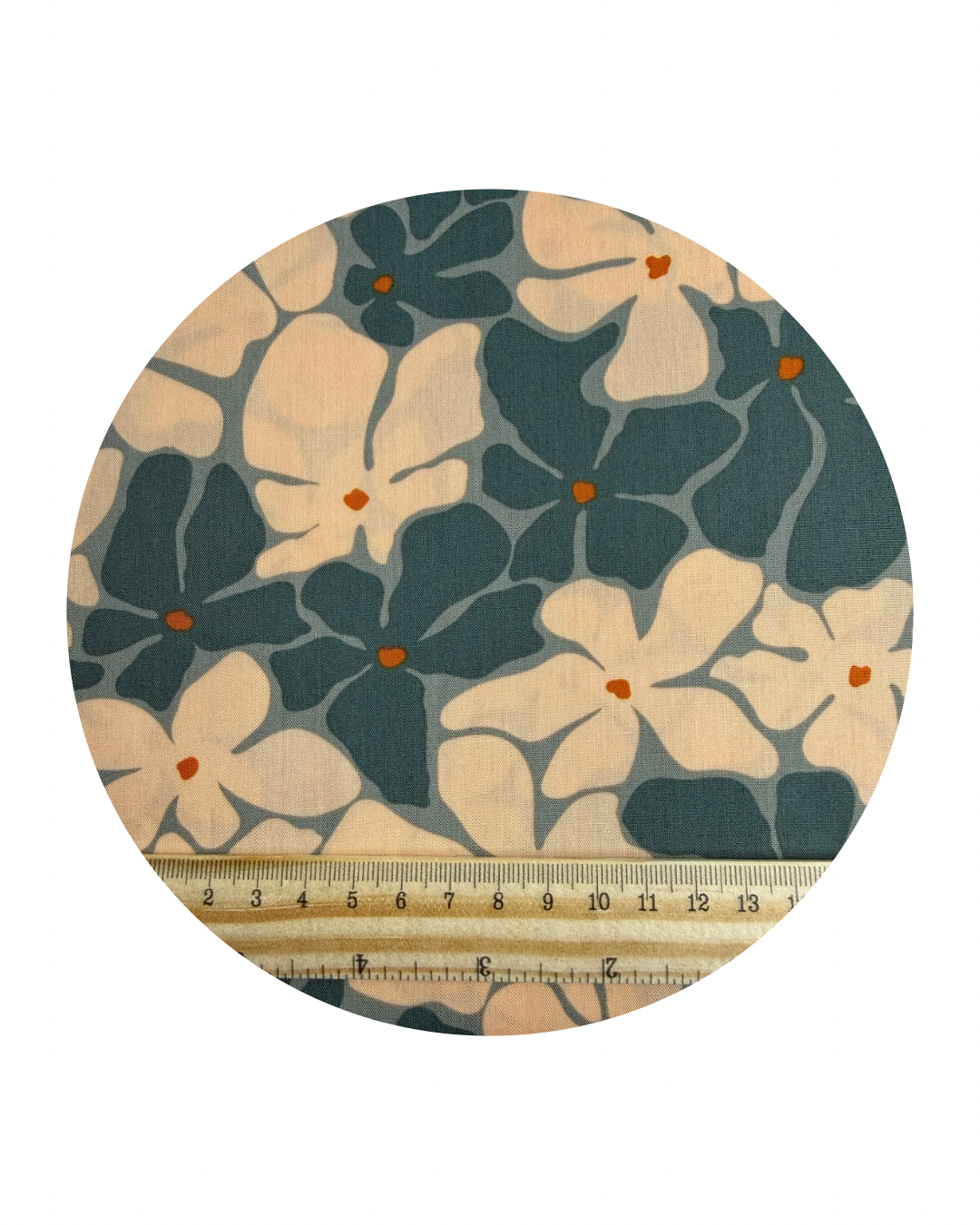 A fabric swatch of Sunset from Tangerine Collection by Art Gallery Fabrics and a wooden ruler in centimeters for scale on a white background.