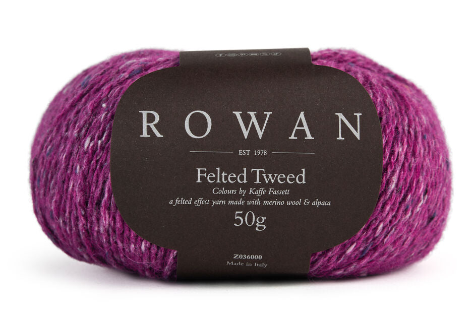 Fuchsia yarn ball with Rowan Felted Tweed Kaffe Fassett label on a white background