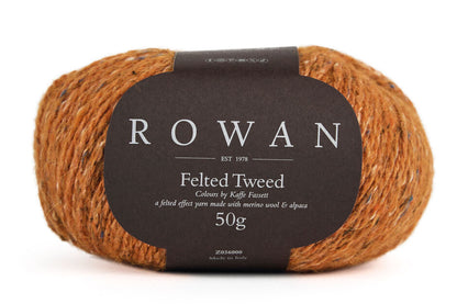 Marigold Orange yarn ball with Rowan Felted Tweed Kaffe Fassett label on a white background
