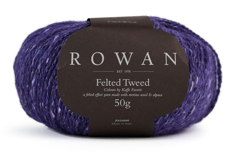 Regal Purple yarn ball with Rowan Felted Tweed Kaffe Fassett label on a white background
