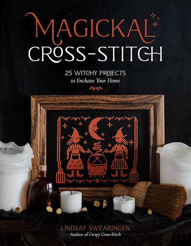 book cover of  'magickal cross stitch' 25 witchy projects to enchant your home. with an image of  witchy cross stitch and candles around it. 