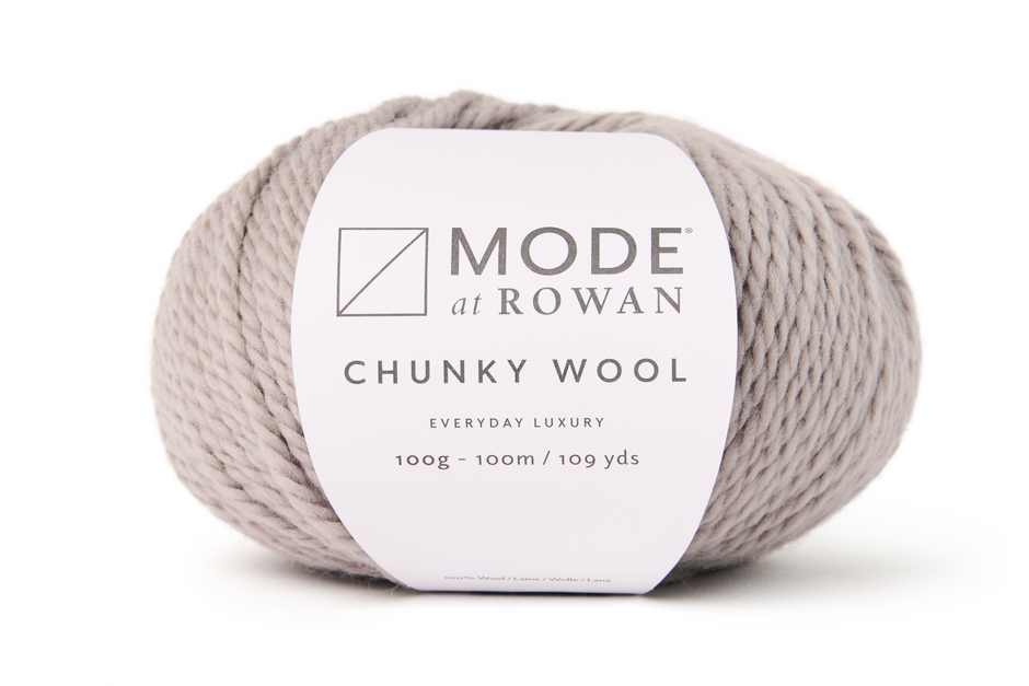 ball of grey yarn with mode at rowan label on a plain white background.