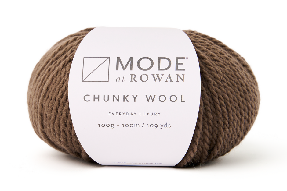 ball of brown yarn with a  mode at rowan label on a plain white background. 