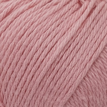close up of light peach coloured cotton yarn.