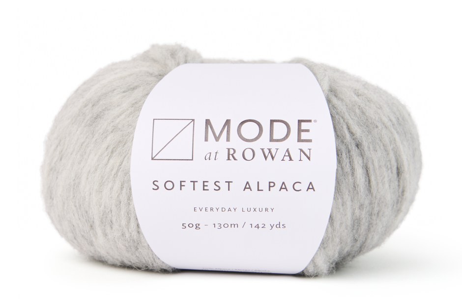 ball of light grey yarn with mode at rowan label on a white background.